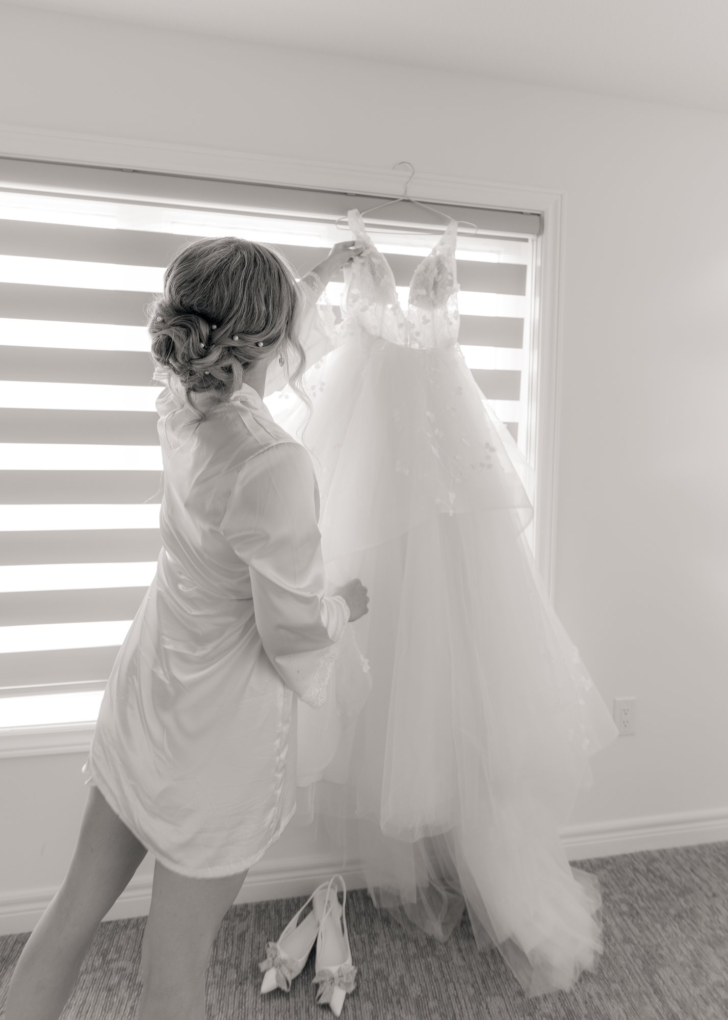 Bride with her wedding dress in Hamilton, Ontario — fine art wedding photography by NN Popa