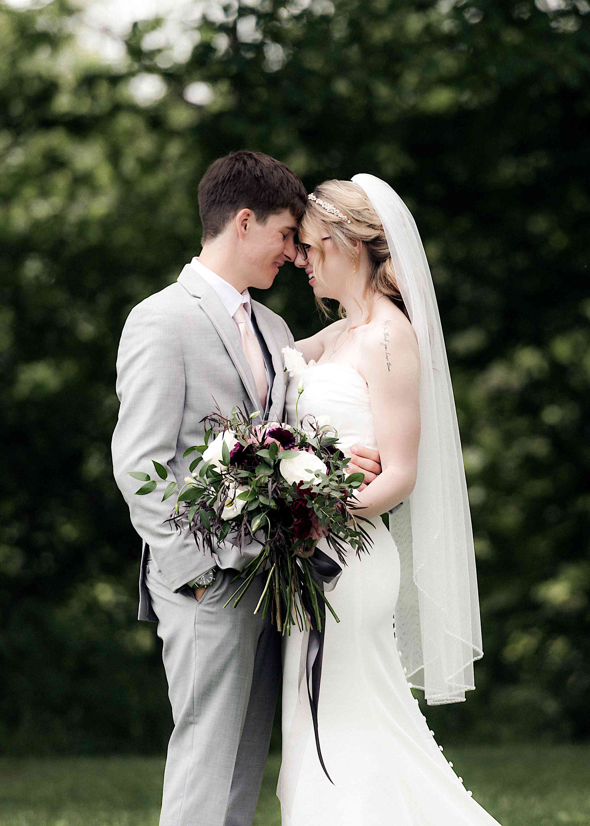 Romantic wedding portrait of bride and groom in an outdoor park setting, Millbank, Ontario